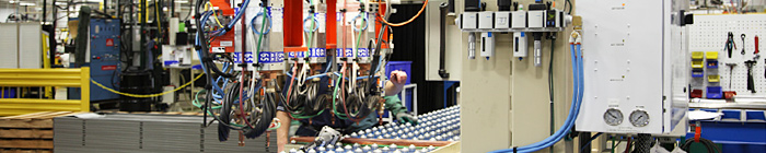 Manufacturing plant photo - Resolving issues with welding machine